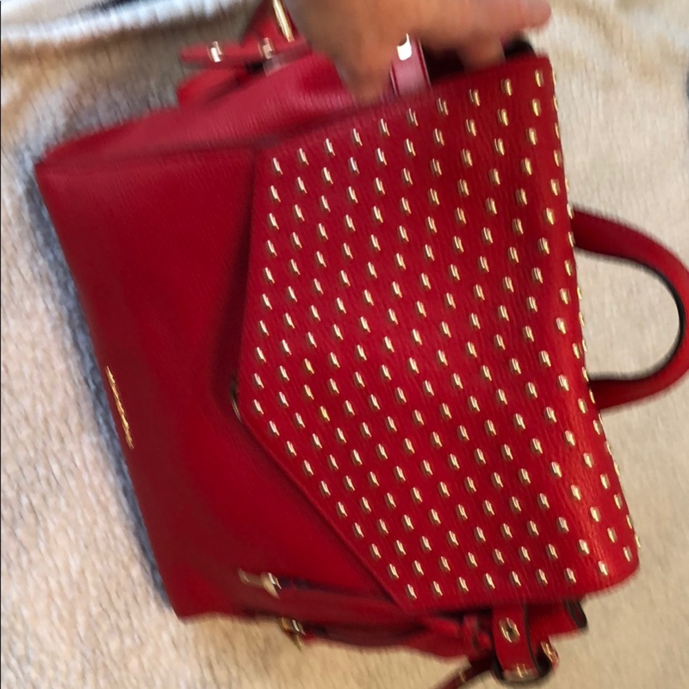 Michael Kors red studded backpack